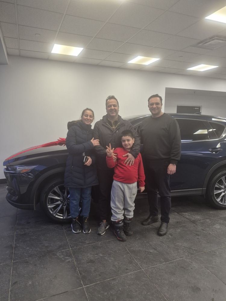 Saman K. & family with their 2021 Mazda CX-5 at Car4Pro, Richmond Hill